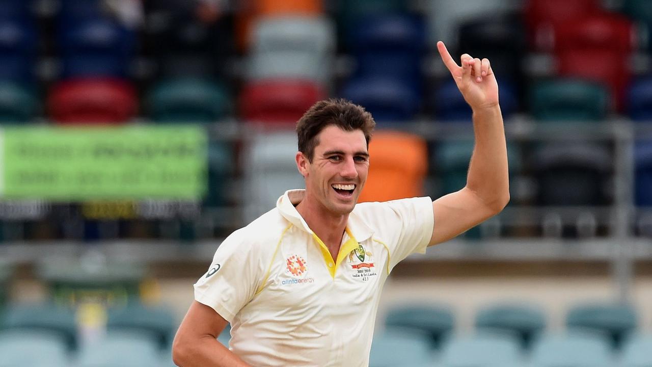 Australia's Pat Cummins celebrates a wicket