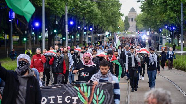 Pro-Palestinian demonstrators march in Melbourne. Picture: Luis Enrique Ascui