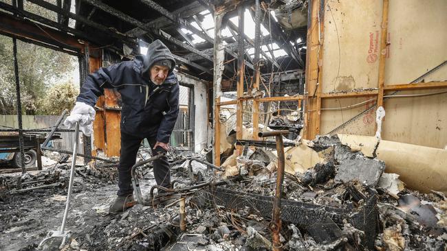 Mr Hehir inspects the damage at his Somerville house. Picture: Valeriu Campan