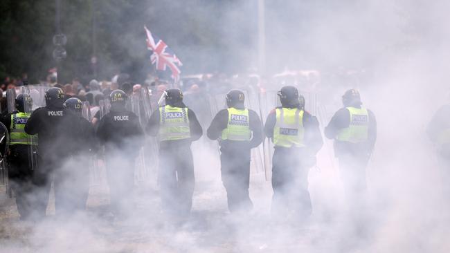 Riot police clash with anti-migration protesters outside of the Holiday Inn Express in Manvers. Picture: Christopher Furlong/Getty Images