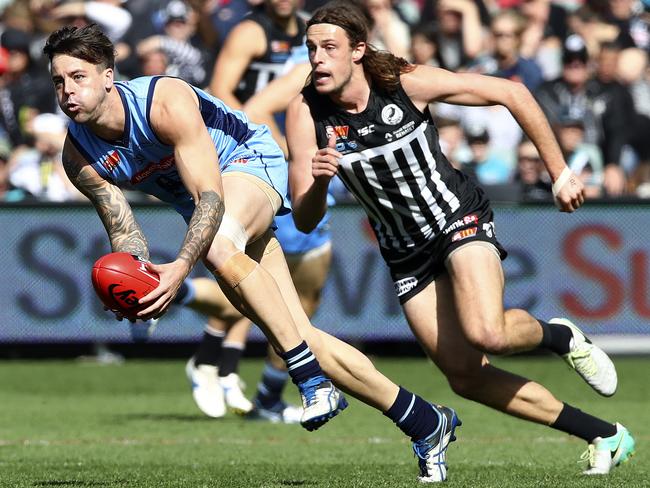 Sturt’s Jake Sutcliffe gets past Port Adelaide’s Jarrod Lienert. Picture: SARAH REED