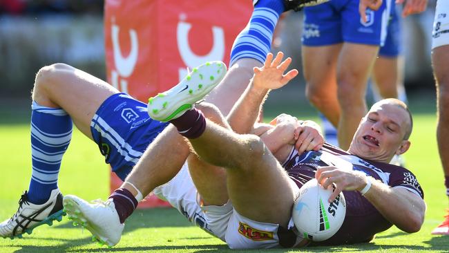 Tom Trbojevic was not at his best against the Bulldogs but he still scored three tries - including this controversial effort. Picture: Albert Perez/Getty Images