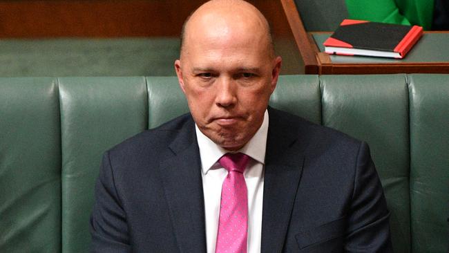 Minister for Home Affairs Peter Dutton during Question Time in the House of Representatives at Parliament House in Canberra, Wednesday, September 12, 2018. (AAP Image/Mick Tsikas) NO ARCHIVING