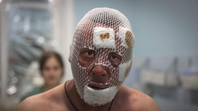 A wounded Ukrainian soldier at a medical camp near Bakhmut