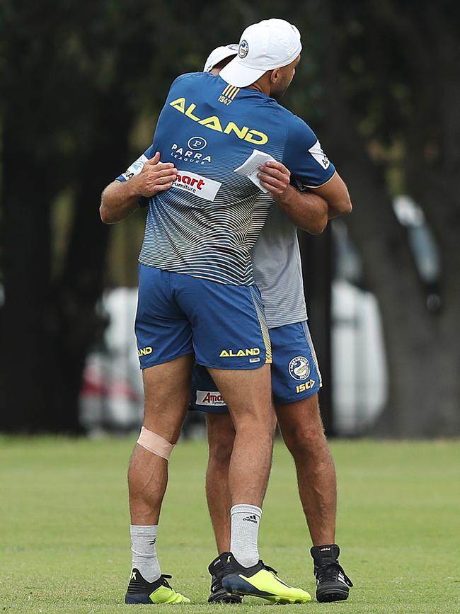 Blake Ferguson gets a hug from coach Brad Arthur during Eels NRL training. Picture: Brett Costello