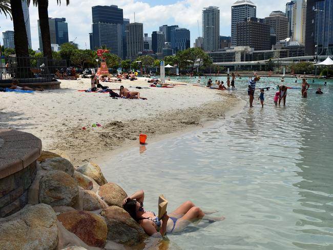 People escape the heat at Southbank in Brisbane yesterday. Picture: AAP