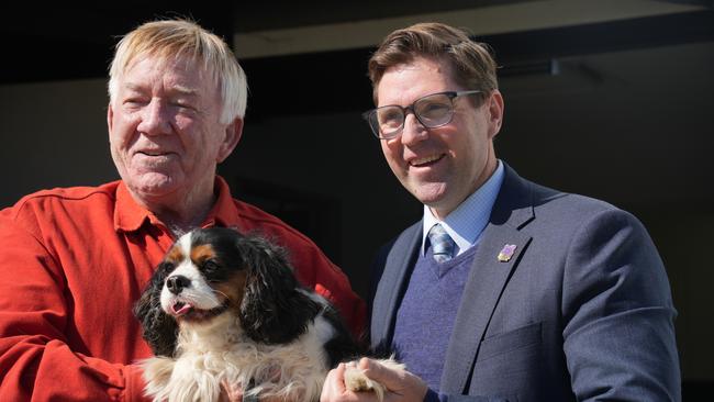 Philanthropist and RSPCA donor Rodney Banks with his dog Cindy and Toowoomba mayor Geoff McDonald outside the $1.3m Banksy Vet Clinic at RSPCA Wellcamp, which was delivered thanks to his financial contributions.