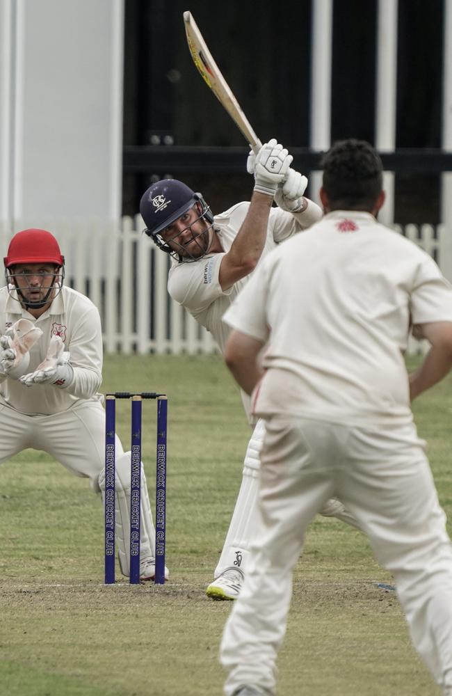 Nick Shirt hits out late in the Berwick innings. Picture: Valeriu Campan