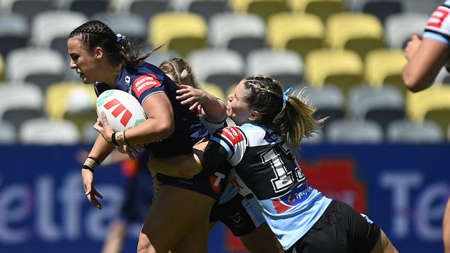 Bree Chester is tackled during round five. (Photo by Ian Hitchcock/Getty Images)