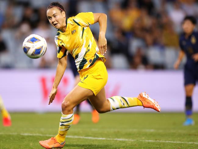 SYDNEY, AUSTRALIA - FEBRUARY 10: Caitlin Foord of the Matildas runs for the ball during the Women's Olympic Football Tournament Qualifier match between Thailand and the Australian Matildas at Campbelltown Sports Stadium on February 10, 2020 in Sydney, Australia. (Photo by Mark Kolbe/Getty Images)