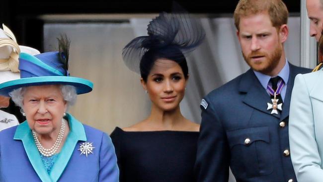 The Queen, Meghan Markle and Prince Harry in 2018. Picture: Tolga AKMEN / AFP.