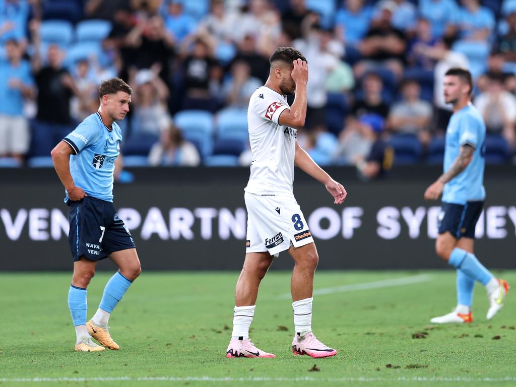 Zinedine Machach of the Victory leaves the field after receiving a red card from Referee Adam Kersey during the round 10 A-League Men match between Sydney FC and Melbourne Victory at Allianz Stadium, on December 28, 2024, in Sydney, Australia. (Photo by Brendon Thorne/Getty Images)