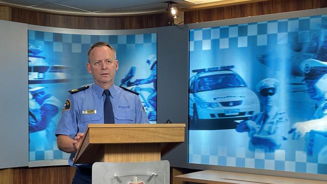 Tasmania Police Assistant Commissioner Adrian Bodnar speaks to the media in Hobart.