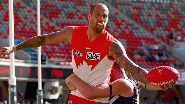 Lance Franklin reacts as he is tackled by Luke Ryan. Picture: Getty Images