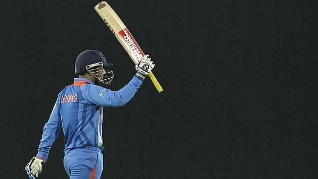 Indian opener Virender Sehwag raises his bat at the last World Cup, a money-spinner for the ICC.