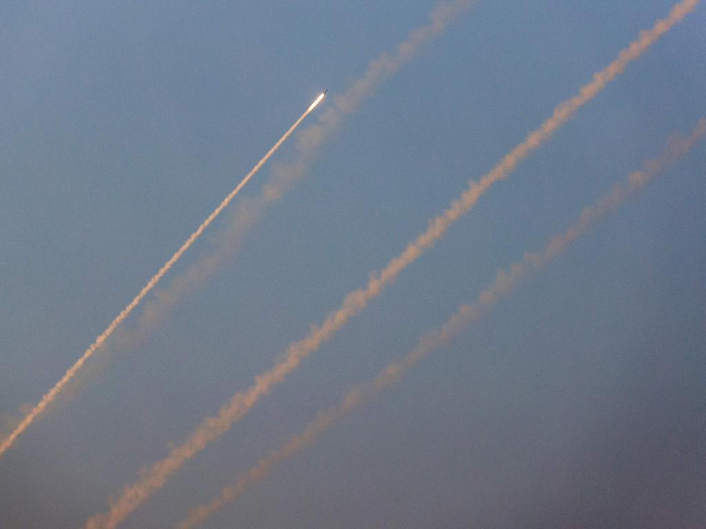 A salvo of rockets is fired from Rafah in the southern of Gaza Strip towards Israel on October 28, 2023 amid the ongoing battles between Israel and the Palestinian group Hamas. (Photo by SAID KHATIB / AFP)