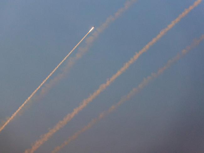 A salvo of rockets is fired from Rafah in the southern of Gaza Strip towards Israel on October 28, 2023 amid the ongoing battles between Israel and the Palestinian group Hamas. (Photo by SAID KHATIB / AFP)