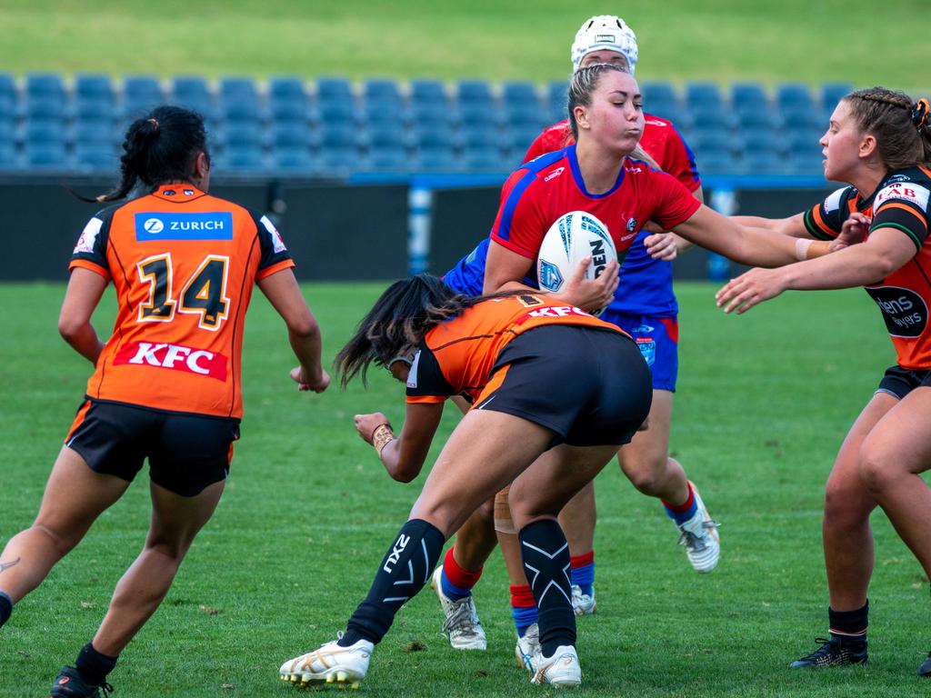 Sienna Limpic on the charge for Newcastle. Picture: Thomas Lisson