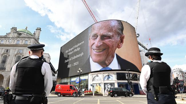 Notice of Prince Philip, Duke of Edinburgh's death is displayed on the large screen at Piccadilly Circus in London. Picture: Getty