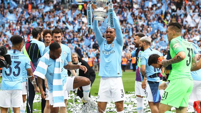 Danilo of Manchester City lifts the trophy following the FA Cup Final match. Picture: Getty Images.