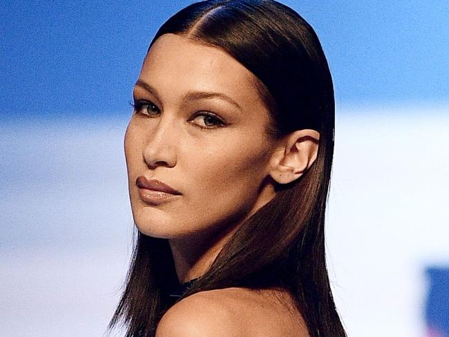 TOPSHOT - US model Bella Hadid presents a creation by Jean Paul Gaultier during the Women's Spring-Summer 2020 Haute Couture collection fashion show in Paris, on January 22, 2020. (Photo by Anne-Christine POUJOULAT / AFP)