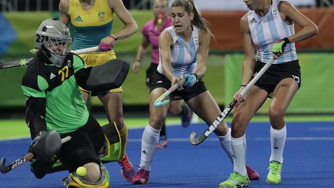 Australia's goalkeeper Rachael Lynch saves the ball against Argentina's Martina Cavallero this morning.