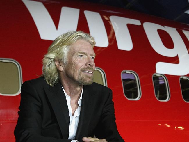 MELBOURNE, AUSTRALIA - SEPTEMBER 12:  Sir Richard Branson celebrates Virgin Blue's 10th Anniversary in Australia at Melbourne Airport on September 12, 2010 in Melbourne, Australia.  (Photo by Robert Prezioso/Getty Images)