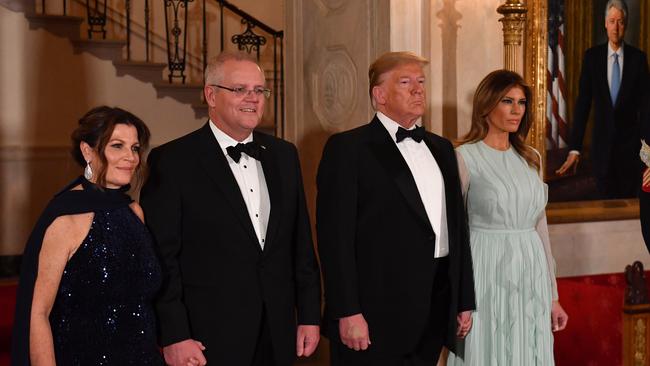 United States President Donald Trump with wife Melania and Prime Minister Scott Morrison with wife Jenny before the state dinner in the Rose Garden at the White House on Saturday.