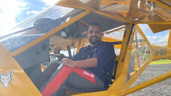 Emergency room doctor, lawyer, researcher and disability advocate Dr Dinesh Palipana, who has quadriplegia, takes his first flying lesson with Wheelies With Wings at Coldstream, Victoria, in June 2022.