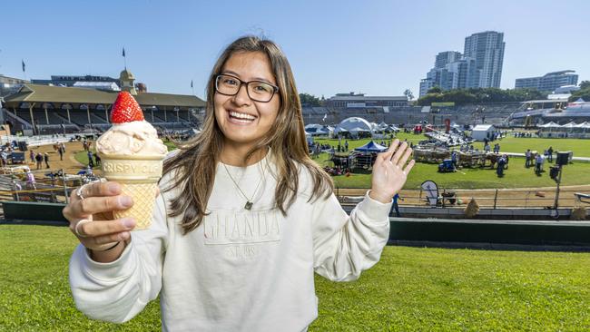 Samantha Loy bought the first strawberry sundae on day one of this year’s Ekka. Picture: Richard Walker