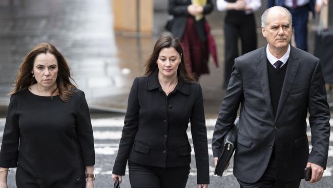 Rebecca Farrell (L), Amelia Berczelly (C) and Michael Harmer (R) pictured walking to Federal Court in Sydney. Picture: Monique Harmer