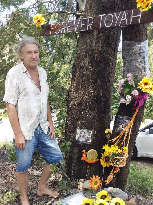 Troy Cordingley returned to Wangetti Beach to lay flowers at the location where he found the body of his daughter Toyah.