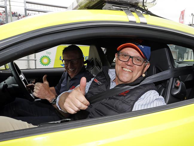 The PM drove a race car and socialised with competitors and spectators for around three hours. Picture: Tim Hunter.