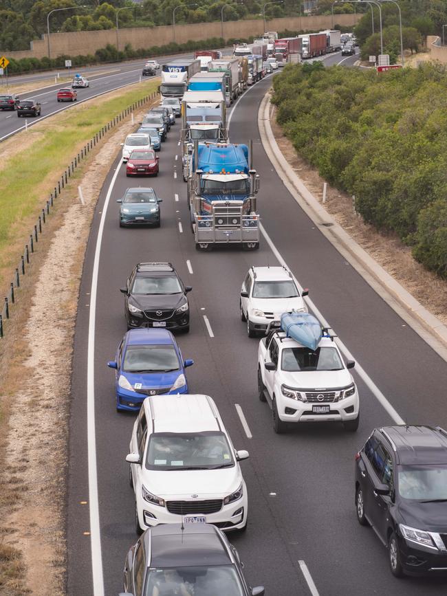 Motorists wait to cross the border into Victoria on the Hume Freeway in Albury on Monday. Picture: Simon Dallinger