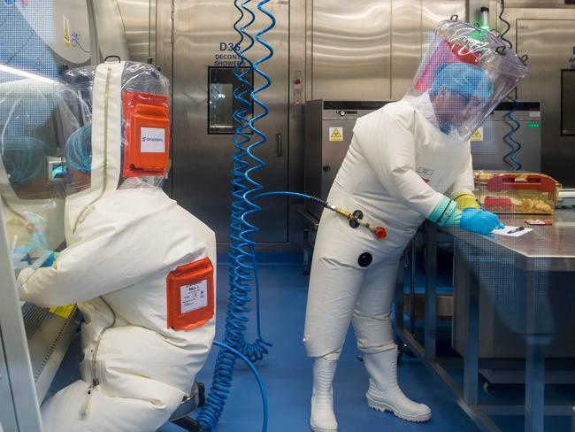 Workers inside the P4 laboratory in Wuhan, China’s Hubei province capital and the epicentre of the coronavirus outbreak. The lab is one of the few in the around cleared to handle dangerous viruses that pose a high risk of person-to-person transmission. Picture: AFP