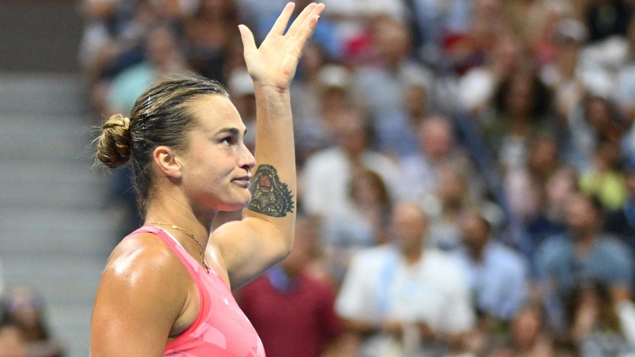 Belarus's Aryna Sabalenka revs up the crowd. Photo by ANGELA WEISS / AFP.