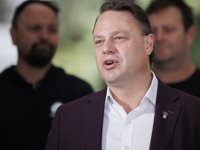 Lord Mayor Adrian Schrinner talking to media with Daylight Savings advocates in King George Square. Picture Lachie Millard