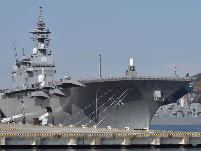 The Japan Maritime Self Defence Forces helicopter carrier Izumo at a berth in its Yokosuka Base. Picture: AFP