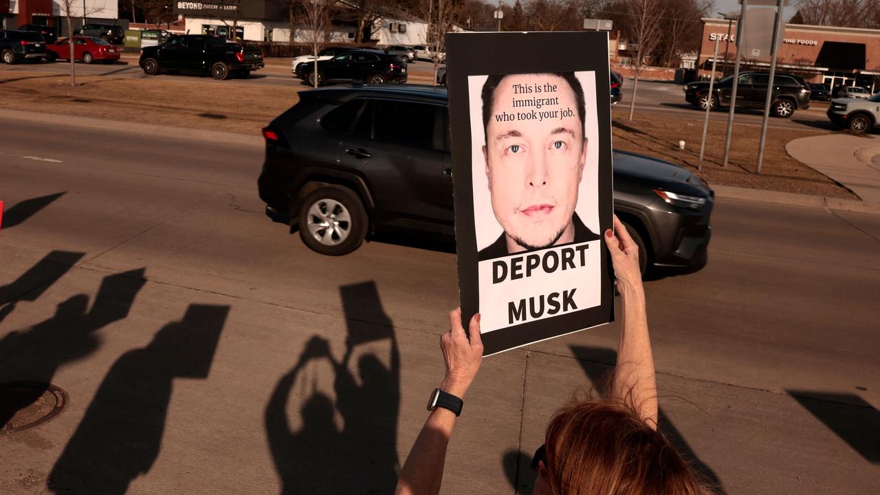 People participate in a protest against Elon Musk outside of a Tesla dealership in West Bloomfield, Michigan. Picture: Jeff Kowalsky/AFP