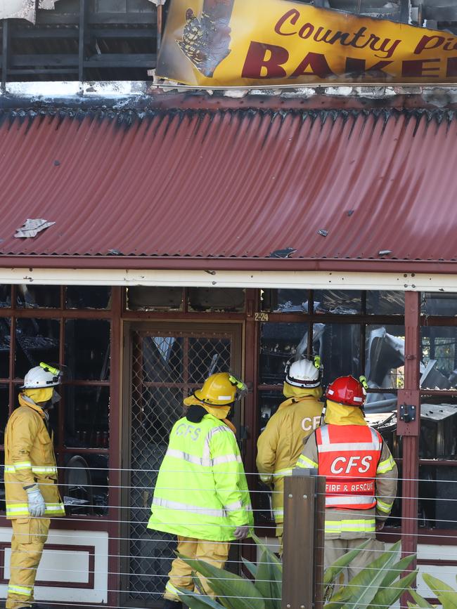 Police Fire Cause investigators at the Mount Compass bakery on Saturday morning. Picture: Dean Martin