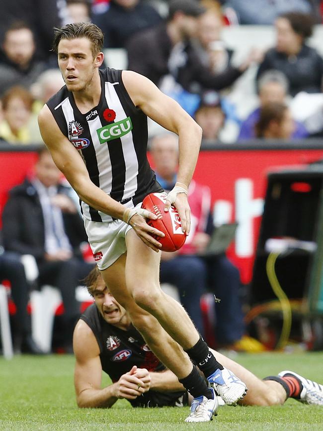 A young Paul Seedsman leaves Jobe Watson behind during his time at Collingwood. Picture: Michael Klein