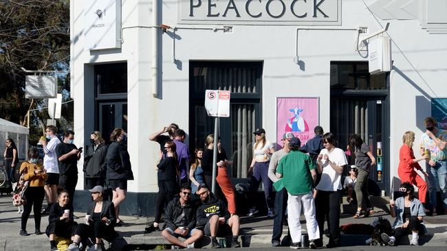 Crowds of people gathering in Northcote on Sunday. Picture: Andrew Henshaw