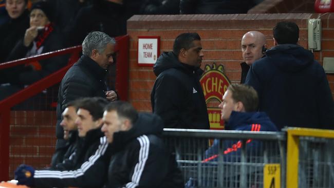 Jose Mourinho, Manager of Manchester United makes his way to the stands/