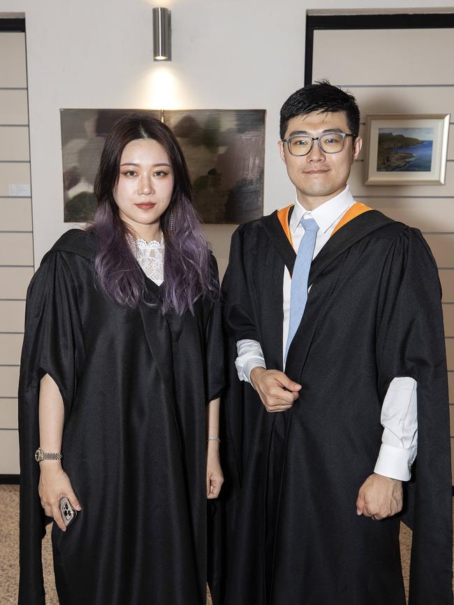 UTAS graduations at Hobart, Joanna Wang and Max Zhang. Picture Chris Kidd