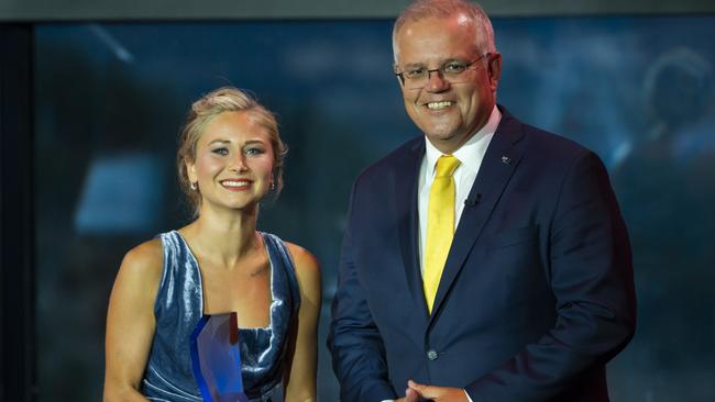 2021 Australian of the Year Grace Tame receives the award from Scott Morrison in Canberra last year. Picture: NCA NewsWire / Martin Ollman