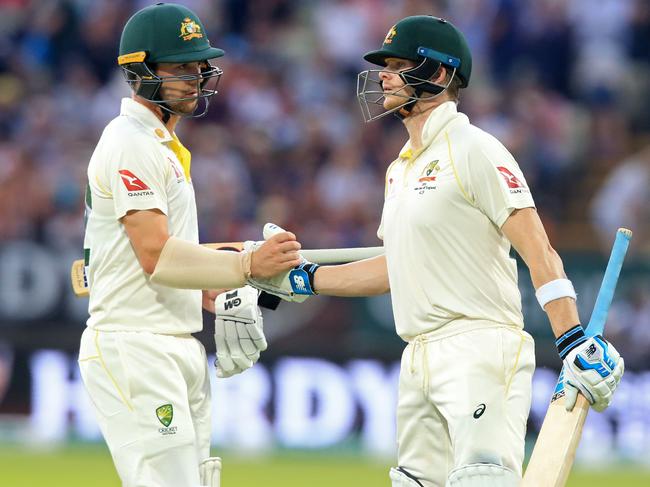 Travis Head (L) enjoyed two partnerships with Steve Smith (R) during the first Ashes Test. Picture: Lindsey Parnaby/AFP