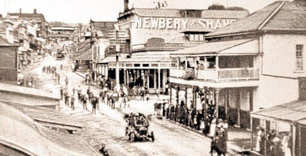 BACK IN TIME: A street parade trails past the Atlantic Hotel in October 1910. Picture: Contributed