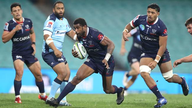 Marika Koroibete of the Rebels breaks through the NSW defence at the SCG. Picture: Getty Images