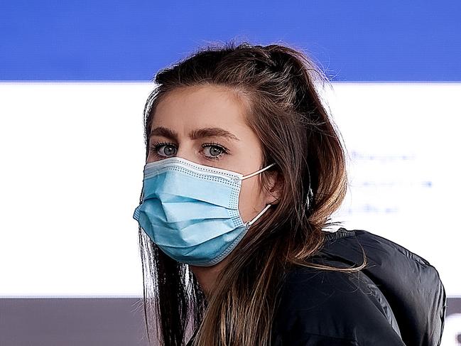 MELBOURNE, AUSTRALIA - NewsWire Photos 24 AUGUST 2021 : A young woman lines up at the Melbourne Convention Exhibition Centre to get a Covid-19 vaccination. Picture : NCA NewsWire / Ian Currie