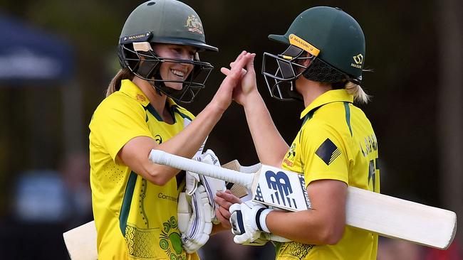 Australia's Ellyse Perry (left) and captain Meg Lanning are hoping for more success at the World Cup. Picture: William West / AFP